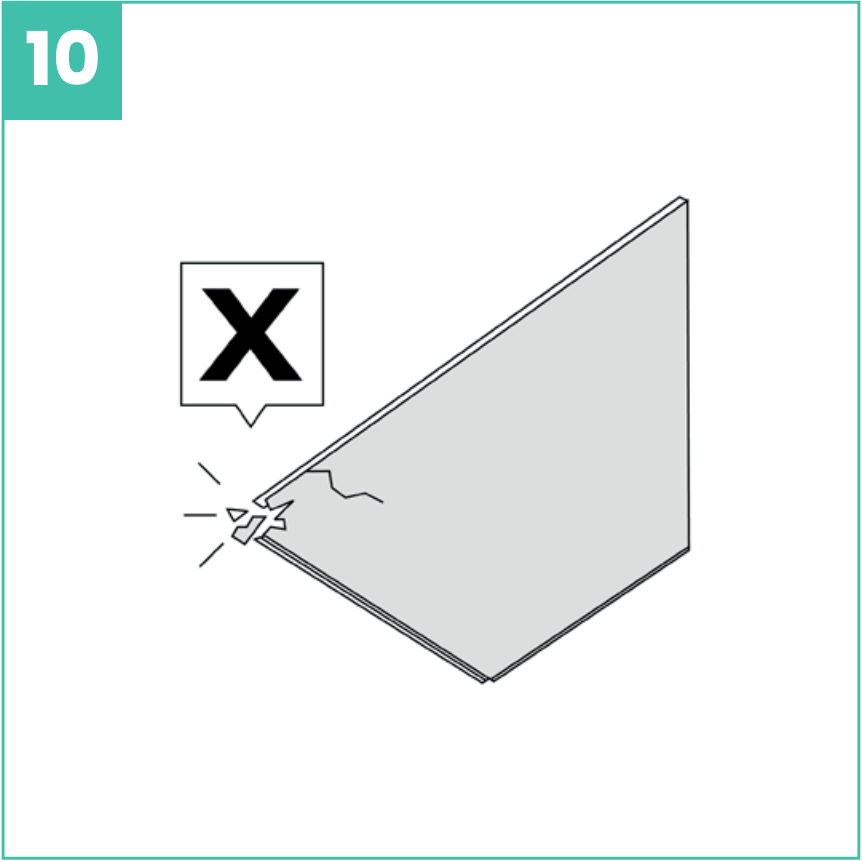 Liimattavan vinyylilankun rikkoutunut lankku