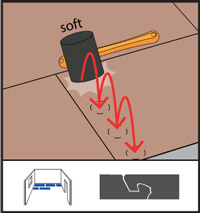 Toisen rivin vinyylilankkujen päätyponttien vasarointi.