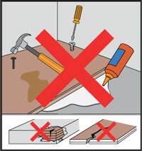 Vinyylilankkujen tarkastaminen ennen asentamista.